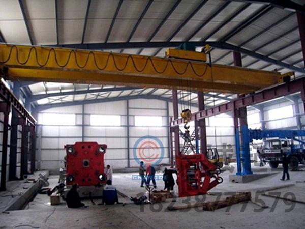 關于豎井龍門吊起重小車的實際應用